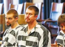  ?? AP FILE PHOTO/LARRY BECKNER ?? Ryan Leaf, center, sits in a Cascade County courtroom in Great Falls, Mont. Ryan Leaf spent most of his time in prison alone and angry until a military veteran persuaded the former No. 2 overall NFL draft pick to stop self-loathing long enough to help fellow inmates learn to read.