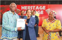  ?? ?? Instak chairman Professor Simbi Mubako hands over the Africa Fact Book to Botswana First Lady Mrs Neo Jane Masisi while First Lady Dr Auxillia Mnangagwa looks on after a tour of the Museum of African Liberation in Harare on Thursday