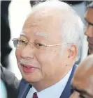  ?? VINCENT THIAN, AP ?? Former Malaysian prime minister Najib Razak arrives at a courthouse in Kuala Lumpur on Wednesday.