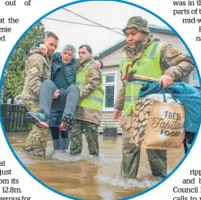  ?? Photo / NZDF ?? NZ Defence Force help evacuate Buller residents.