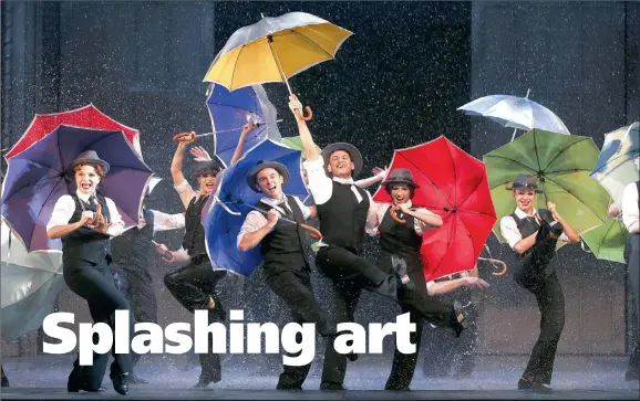  ?? Singin’ In The Rain
PICTURES: HAGEN HOPKINS ?? DRENCHED: Anne Power, Mila De Biaggi, Steven van Wyk, Grant Almirall, Bethany Dickson in
at the St James Theatre, Wellington, New Zealand in April.