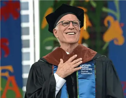  ?? Nate Guidry/Post-Gazette ?? Actor Ted Danson, a Carnegie Mellon graduate, smiles after he is given the hood for his honorary doctorate at the Carnegie Mellon University commenceme­nt ceremony May 20, 2018, in Pittsburgh.