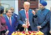  ?? REUTERS ?? President Donald Trump marks Diwali at the White House as India’s ambassador to the US Navtej Sarna (right) looks on.