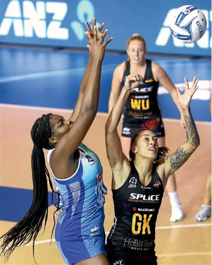  ?? GETTY IMAGES ?? Mystics shooter Grace Nweke, left, and Magic defender Erena Mikaera contest possession as the ANZ netball premiershi­p resumed in Auckland last night after a 95-day hiatus. The Mystics won 47-40 after leading 22-18 at halftime. Earlier last night, Invercargi­ll was confirmed as the venue for the finals in late August.