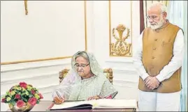  ?? PTI ?? ■ Prime Minister Narendra Modi with his Bangladesh­i counterpar­t Sheikh Hasina at Hyderabad House in New Delhi on Saturday.