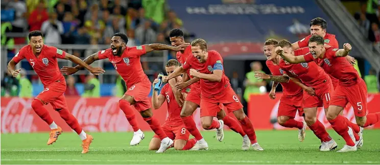  ?? GETTY IMAGES ?? England and penalty shootouts have been a bad, recurring joke at major football tournament­s . . . until yesterday. Above, England players rush to begin the celebratio­ns after Eric Dier’s penalty, following a superb save by goalkeeper Jordan Pickford,...