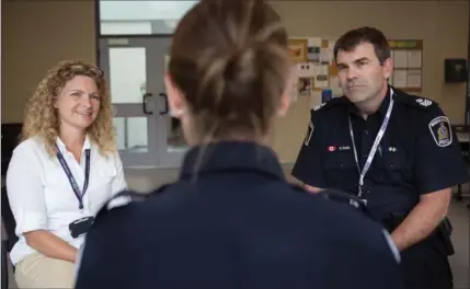  ?? VANESSA TIGNANELLI, RECORD STAFF ?? Waterloo Regional Police staff wellness co-ordinator Shelley Howes and Staff Sgt. Dean Smith work in a wellness unit to help officers.