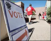  ?? STEVE MARCUS ?? A voter heads to the polls Tuesday at Veterans Memorial Leisure Center in Summerlin.