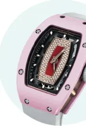  ??  ?? Richard Mille offers a pop of pink this season with this special RM 07-01 ($110,000), featuring an automatic caliber CRMA2 movement that is exclusive to this timepiece. The classic tonneau-shaped case is crafted from pink ceramic and red gold and...