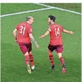  ?? FOTO: DPA ?? Jonas Hector (r.) bejubelt sein Tor zum 2:1 mit Marius Wolf.