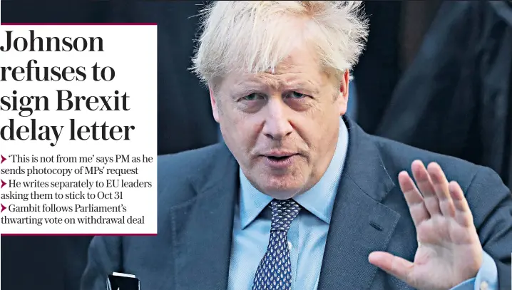  ??  ?? Boris Johnson yesterday insisted he was not ‘daunted or dismayed’ after an expected vote on his Brexit Withdrawal Agreement was scuppered by MPs. He also insisted he would not negotiate a delay with the EU and said the law did not compel him to do so