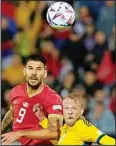  ?? ?? Serbia’s Aleksandar Mitrovic (left), battles for the ball during the UEFA Nations League soccer match between Serbia and Sweden at the Rajko Mitic Stadium in Belgrade, Serbia. (AP)