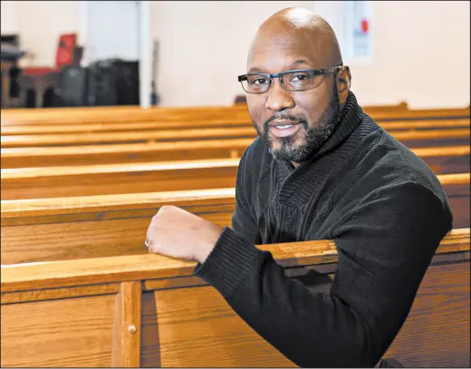  ?? MICHAEL GARD/POST-TRIBUNE ?? The Rev. Corey Jackson, pastor of New Shiloh Baptist Church in Gary, has held services outdoors throughout the pandemic and is making plans to return to indoor services March 7.