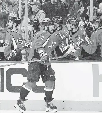  ?? NICK WASS
THE ASSOCIATED PRESS ?? Washington Capitals left-winger Alex Ovechkin celebrates his goal with the bench during the first period.