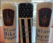  ??  ?? Each mug is hand-crafted with the recipient’s name, rank, badge, and symbols representi­ng their role in the service organizati­on in which they serve.