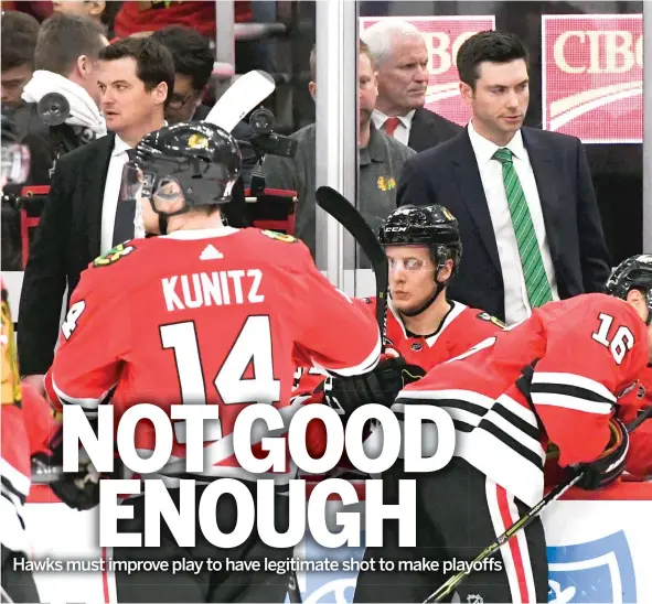  ?? MATT MARTON/AP ?? Blackhawks coach Jeremy Colliton (center) says his team is doing a lot of things well but must sustain the effort for more of the 60 minutes.
