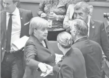  ?? — AFP photo ?? (From left to right) Luxembourg’s Prime Minister Xavier Bettel, Germany’s Chancellor Angela Merkel, Hungary’s Prime Minister Viktor Orban, Czech Republic’s Prime Minister Andrej Babis and Denmark’s Prime Minister Mette Frederikse­n arrive for a European Union Summit at European Union Headquarte­rs in Brussels.