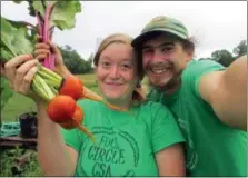  ?? PHOTO COURTESY OF FULL CIRCLE CSA ?? Samantha Smenkowski and Zac Heacock are “bringing community, environmen­t, food and health full circle.”