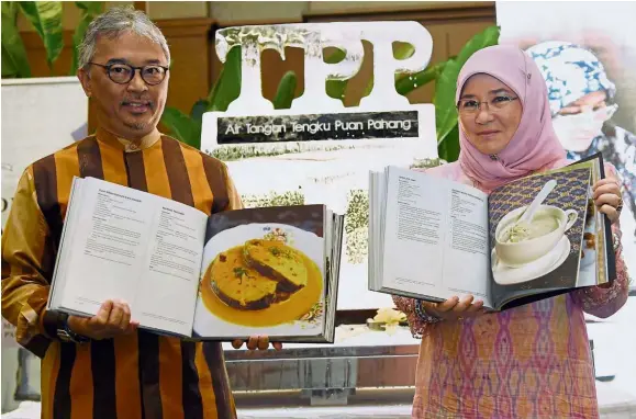  ?? — Filepic ?? Tunku Azizah and Yang di-Pertuan Agong Al-Sultan Abdullah at the launch of Tunku Azizah’s cookbooks in 2018. Tunku Azizah is passionate about preserving the traditiona­l recipes of her home state Pahang.