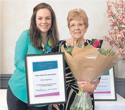  ?? Picture: Richard Wilson. ?? Helen Hodgkinson, right, receives her award from MSP Kate Forbes.