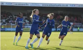  ?? Harriet Lander/Chelsea FC/Getty Images ?? Aggie Beever-Jones receives congratula­tions after giving Chelsea the lead. Photograph: