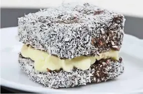  ?? — Photos: LOW LAY PHON /The Star ?? lamingtons can be served on their own or filled with strawberry jam and cream between the halves.