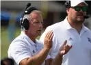  ?? Photograph: Sam Wolfe/The State via AP ?? Presbyteri­an head coach Kevin Kelley coaches his team against St Andrews at Bailey Memorial Stadium in Clinton, South Carolina.