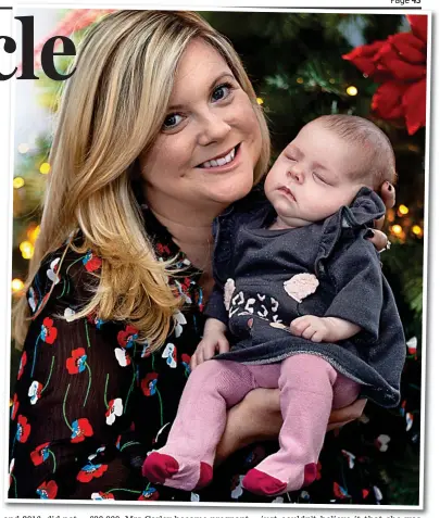  ??  ?? Emotional: Michelle Corley and baby Lily, who was born in October after genetic screening for cystic fibrosis