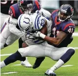  ?? Brett Coomer / Houston Chronicle ?? Zach Cunningham, right, has emerged as a reliable starter at inside linebacker for the Texans since stepping in for Brian Cushing. Cunningham is fourth on the team with 43 tackles.