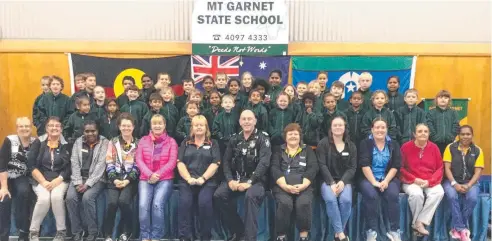  ??  ?? GENEROUS: Police bought 60 fleece jumpers for Mt Garnet State School students.
Picture: SUPPLIED