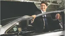  ?? LAURa PEDERSEN ?? Liberal Leader Justin Trudeau exits the driver’s side of a 2017 Chevrolet Bolt electric car.