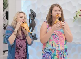  ??  ?? Kate McKinnon, left, and Jillian Bell gorge themselves on pizza slices in Rough Night.