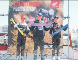  ??  ?? Woodville NZ MX2 Grand Prix placegette­rs — from left: Wyatt Chase (2nd), Maximus Purvis (1st) Josiah Natzke (3rd).