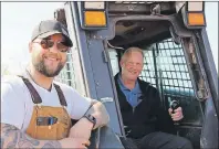  ?? MILLICENT MCKAY/JOURNAL PIONEER ?? Daniel Albert, left, and Gordie Whitlock with a skid steer are at the soon to be RC car park opening in Summerside on June 10. The park is located at the Summerside Wind Farm.