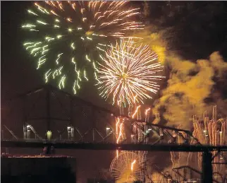  ?? JOHN MAHONEY ?? Jacques Cartier Bridge is accessible only to pedestrian­s and emergency vehicles during the fireworks.