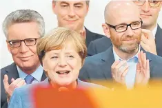  ??  ?? Merkel reacts after winning the German general election (Bundestags­wahl) in Berlin, Germany on September 24. — Reuters photo