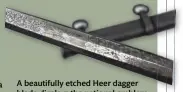  ?? ?? A beautifull­y etched Heer dagger blade displays the national emblem on the flat of the blade (icollector)