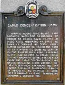  ?? —BERNARD SUPETRAN ?? Capas Train Station marker