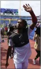  ?? ?? Bills safety Damar Hamlin waves to fans after Saturday's preseason game against the Colts.