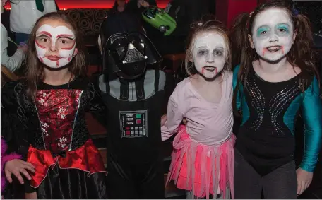  ??  ?? Atene Baliukevic­iene, Sam Reade, Alessia and Eva Snell at the Gaelscoil Chill Mhantáin Halloween disco in the Grand Hotel.