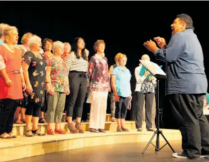  ?? ?? Hawke’s Bay Community Choir musical director Tevivi Daniel steers the musical path of his fine singers.