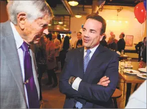  ?? Christian Abraham / Hearst Connecticu­t Media ?? Mayor Joe Ganim chats with Edward Marcus, left, former Democratic State Central Committee chairman and former state Senate majority leader, during a fundraiser for Ganim’s mayoral reelection bid at Brewport restaurant in Bridgeport on Tuesday.
David Stemerman, former candidate for the Republican gubernator­ial nomination, speaks with the media during a primary night reception at The Westport Inn in Westport on Aug. 14, 2018.