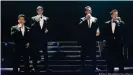  ?? ?? Los miembros del grupo vocal multinacio­nal de ópera pop Il Divo: (de izquierda a derecha) Carlos Marin, Sebastien Izambard, Urs Buhler y David Miller actúan durante un concierto en el Papp Laszlo Budapest Sports Arena en Budapest, Hungría, a finales del 20 de septiembre de 2012.