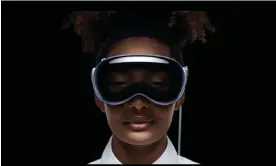  ?? ?? A new era of ‘spatial computing’? … a model wears the new Apple Vision Pro. Photograph: Apple