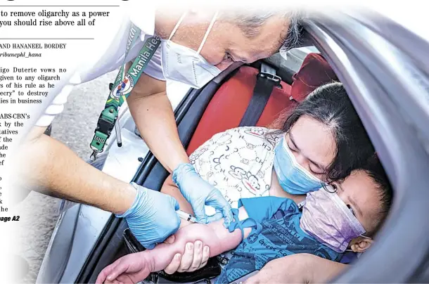  ?? PHOTOGRAPH BY YUMMIE DINGDING FOR THE DAILY TRIBUNE @tribunephl_yumi ?? Brave new world For the youth who will grow up to new realities wrought by the coronaviru­s pandemic, a little blood, sweat and tears may come in the form of a blood sample taken by a medic to be examined in a laboratory as part of the COVID-19 test at the newly launched testing center in the city of Manila.