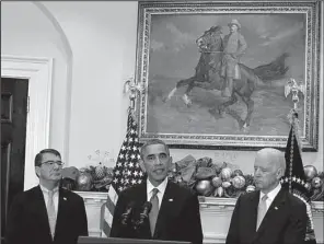  ?? AP/SUSAN WALSH ?? Ashton Carter (left) stands with President Barack Obama and Vice President Joe Biden as his nomination as defense secretary is announced Friday in the Roosevelt Room of the White House.