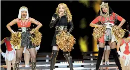  ??  ?? From left: Nicki Minaj, Madonna and MIA perform during the Super Bowl halftime show in 2012. Photograph: Jeff Kravitz/FilmMagic