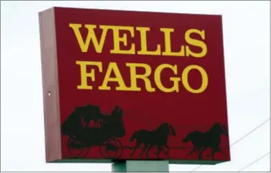 ?? ROGELIO V. SOLIS — THE ASSOCIATED PRESS FILE ?? At least three lawsuits have now been filed against Wells Fargo from customers who say they were hurt by the bank’s latest scandal, involving how it operated its auto lending business.