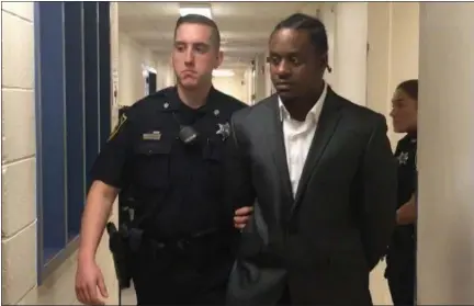  ?? CARL HESSLER JR. — MEDIANEWS GROUP ?? Bobbie Mitchell Jr. of Pottstown, is escorted from Montgomery County courtroom after he was convicted of first-degree murder, sentenced to life in prison, for the Easter 2018 gunshot slaying of ex-girlfriend Siani Overby.