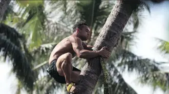  ?? GREGORY BOISSY/AFP/GETTY IMAGES ?? As part of a new Hawaiian hula course, a teacher puts students through stamina-building activities used by warriors of centuries past, including tree-climbing and ocean swimming.